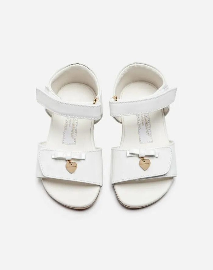 Dolce and Gabbana Shoes For First Steps 1926 Children Patent Leather Sandals With Charm Embellishment White Dolce and Gabbana Shoes For First Steps 1926 Children Patent Leather Sandals With Charm Embellishment White
