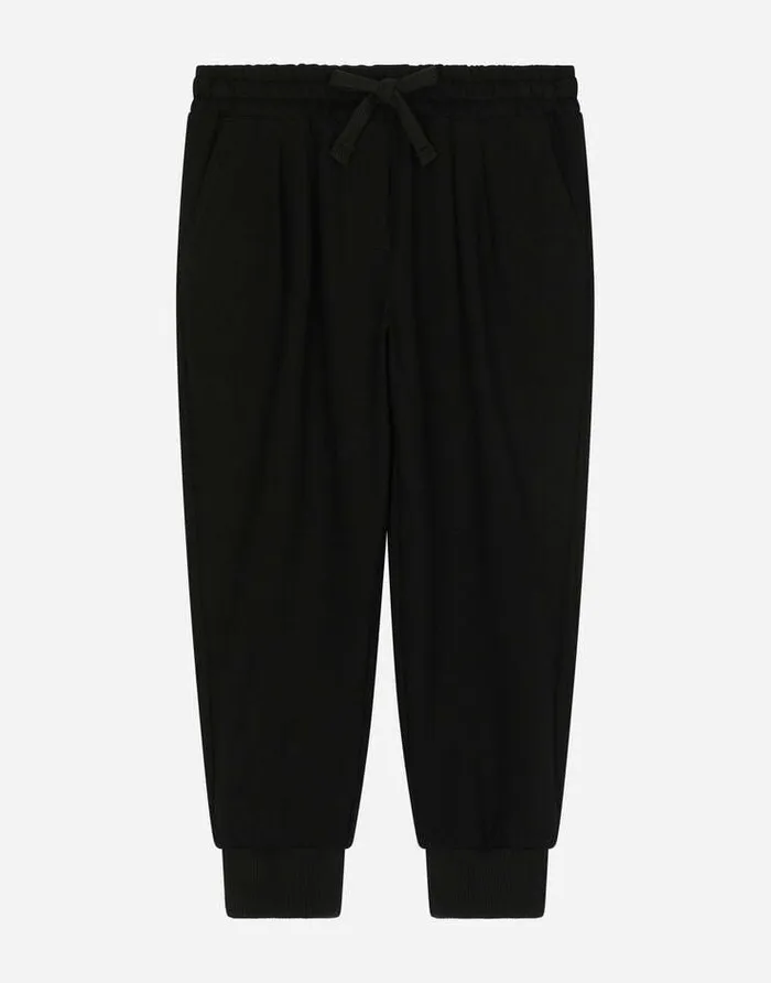 Dolce and Gabbana Trousers And Skirts Children Jersey Jogging Pants With DG Logo Patch Embellishment Black Dolce and Gabbana Trousers And Skirts Children Jersey Jogging Pants With DG Logo Patch Embellishment Black