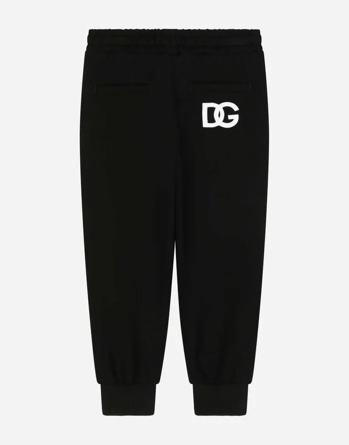 Dolce and Gabbana Trousers And Skirts Children Jersey Jogging Pants With DG Logo Patch Embellishment Black Dolce and Gabbana Trousers And Skirts Children Jersey Jogging Pants With DG Logo Patch Embellishment Black