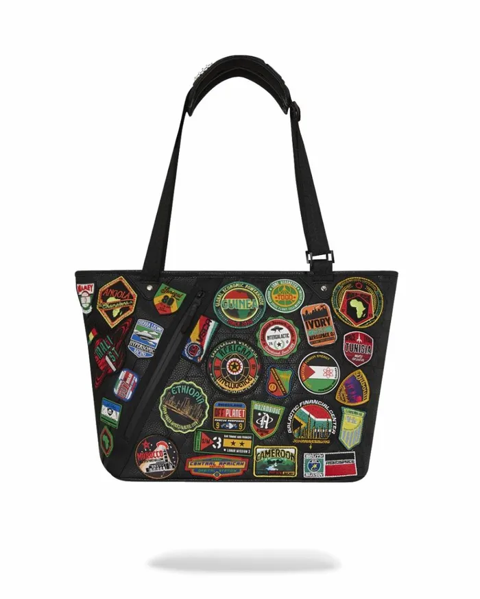 SPRAYGROUND AI THE 54 PATCHES OF AFRICA CARGO TOTE Bags