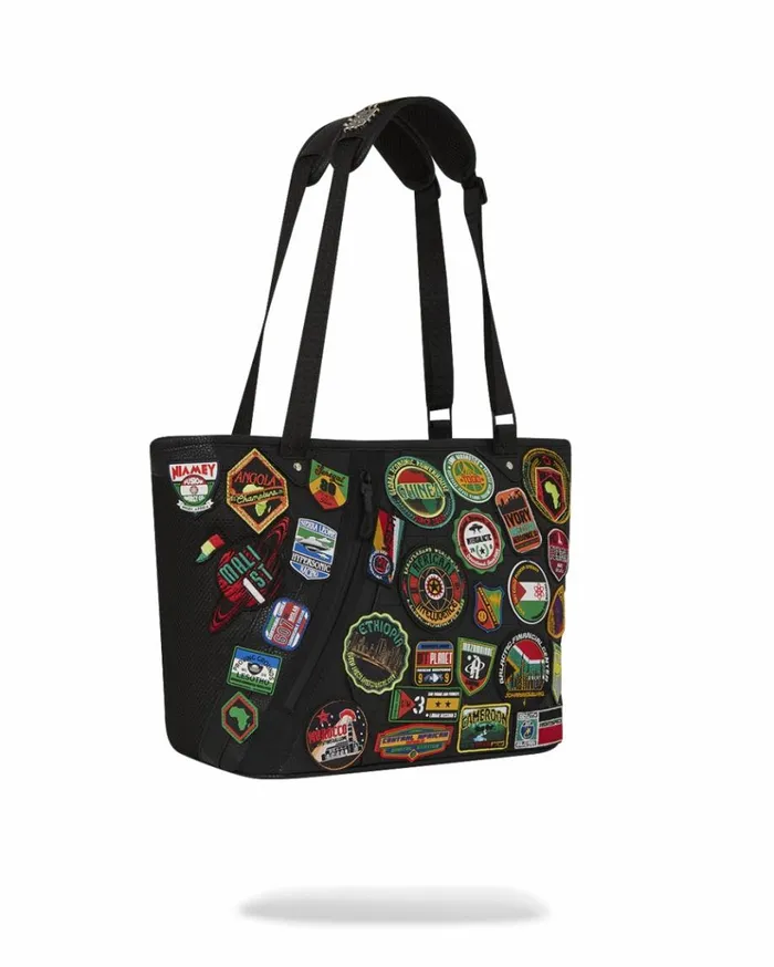 SPRAYGROUND AI THE 54 PATCHES OF AFRICA CARGO TOTE Bags
